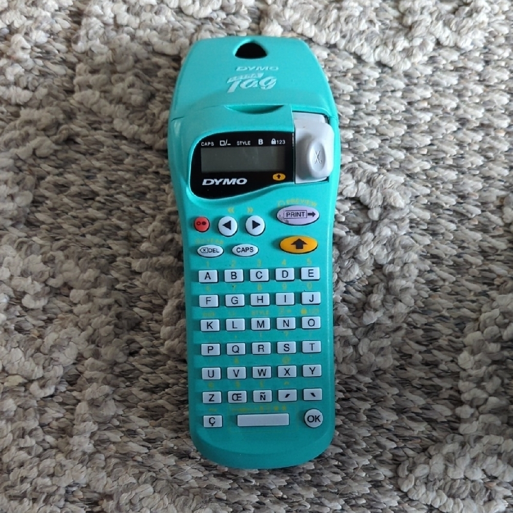 Dymo Letratag label printer. Teal dymo hand printer.